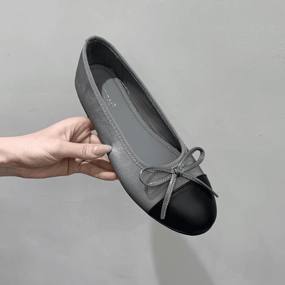 Svarta loafers med rosett