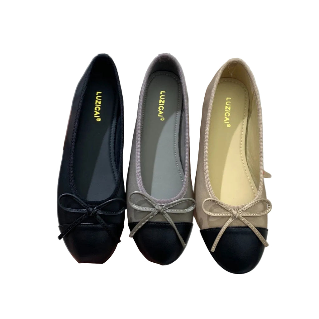 Svarta loafers med rosett